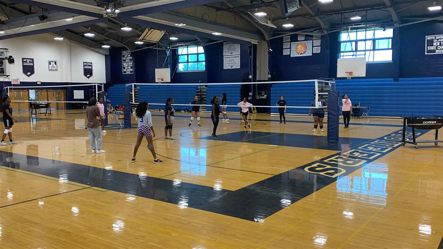  The PHS girls varsity volleyball team practices in the gym